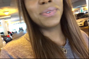 Luxurious black woman pissing in crowded